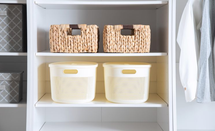 This,Image,Depicts,A,White,Closet,With,Multiple,Baskets,On