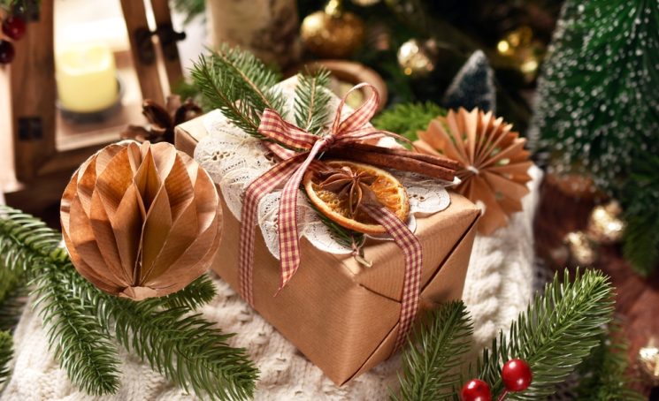 Creatively,Wrapped,Christmas,Present,With,Vintage,Style,Lace,Doily,,Fir